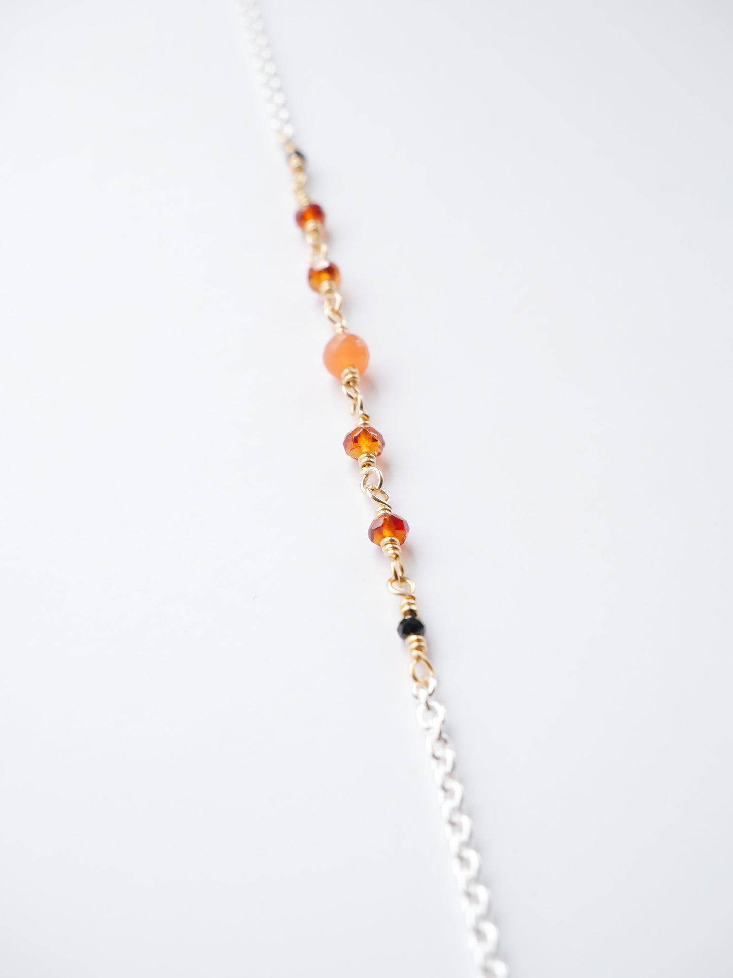 NOSTALGIA BRACELET – peach moonstone, spessartite garnet & black spinel